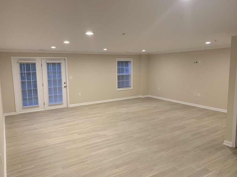 Finished basement with french doors