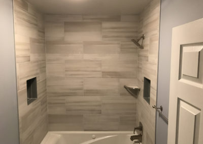 After remodel with tile shower surround